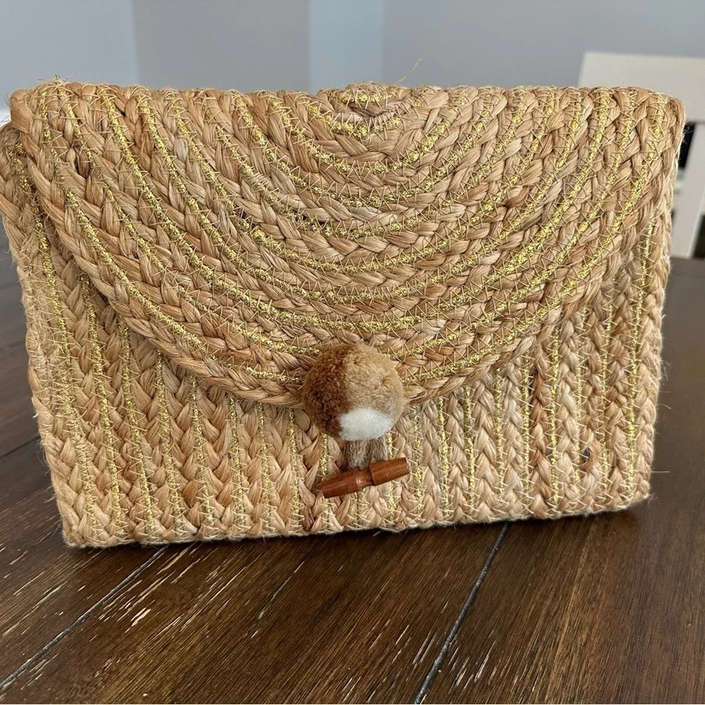 America & Beyond handwoven clutch